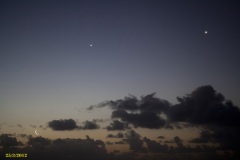 Conjunction of Venus, Jupiter and the crescent moon.